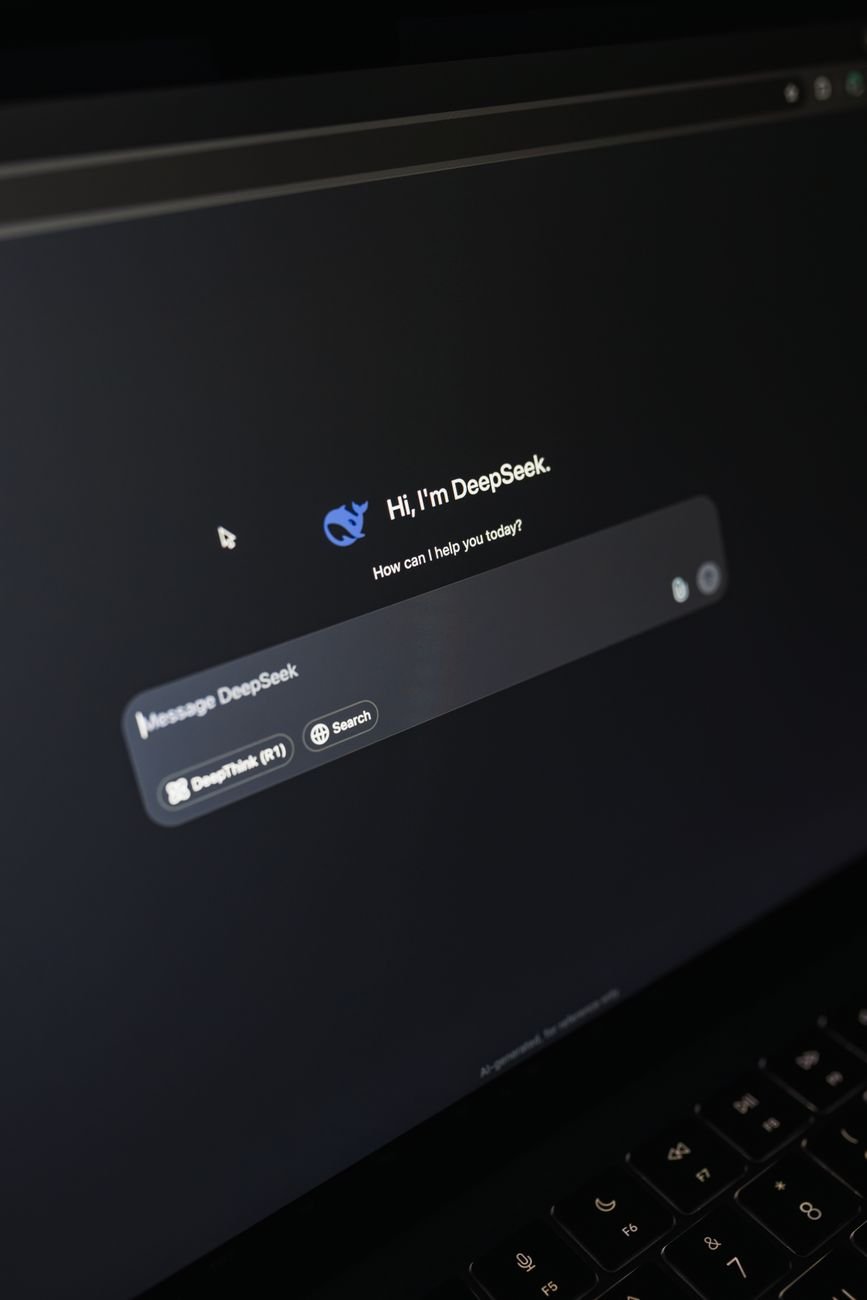 AI chatbot interface on laptop screen — Bella Creates product demo format